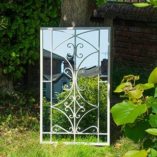Dekoratívne vonkajšie záhradné zrkadlo